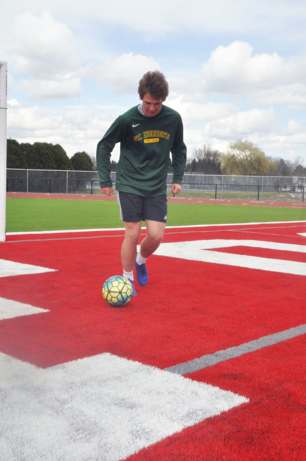 Soccer player dribbles the ball at Big Foot